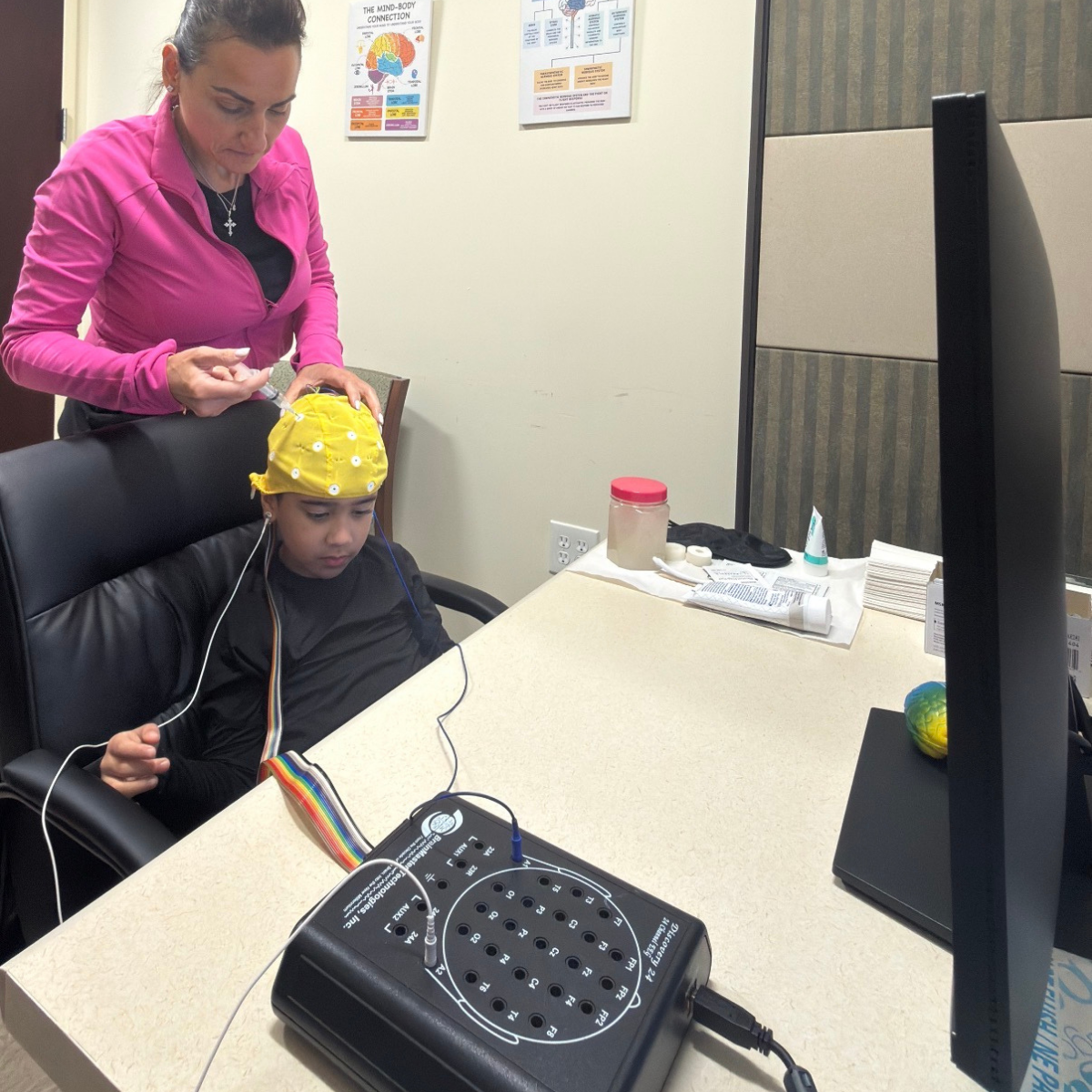Child participating in pediatric neurofeedback session at NJPNI